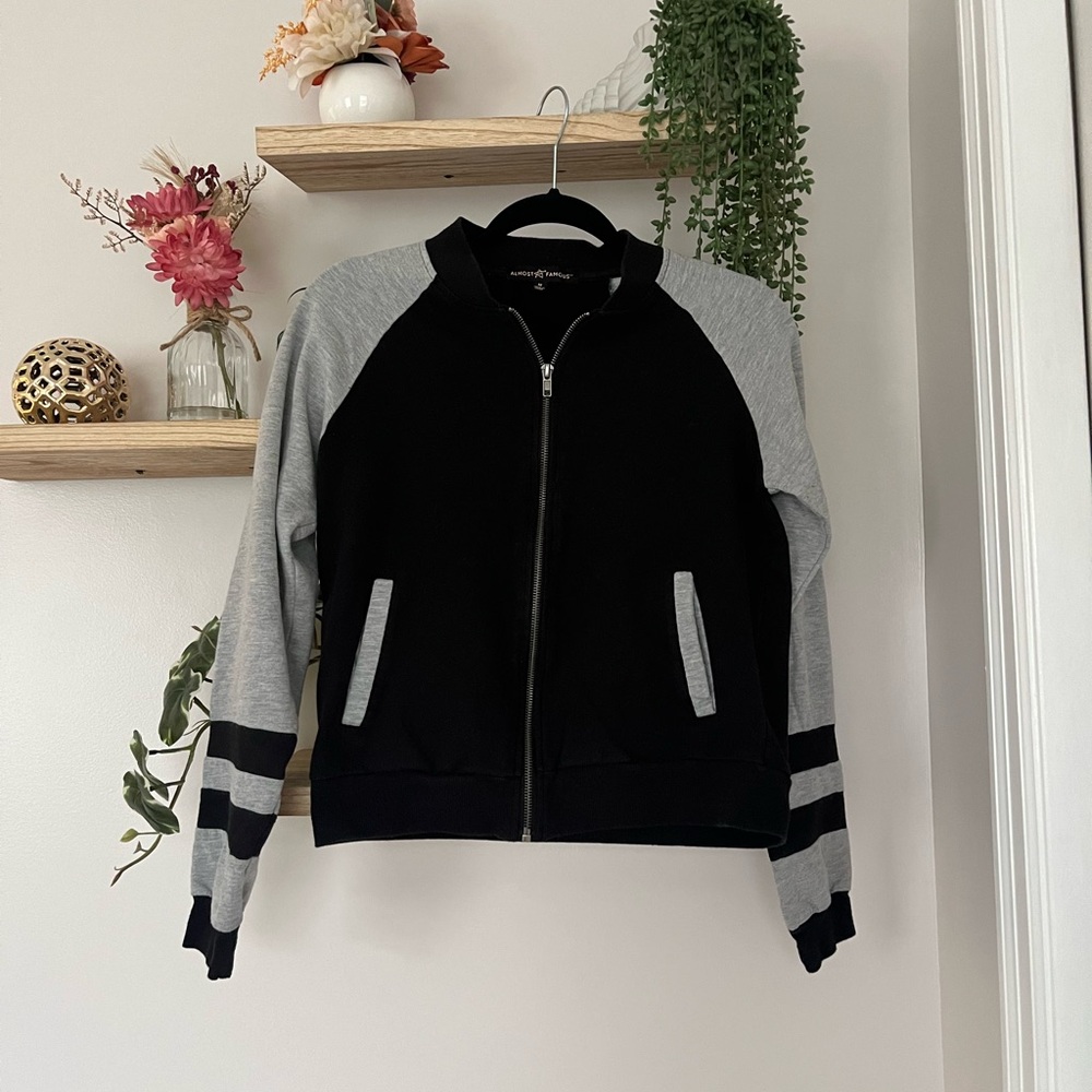 Grey and black zip-up jacket